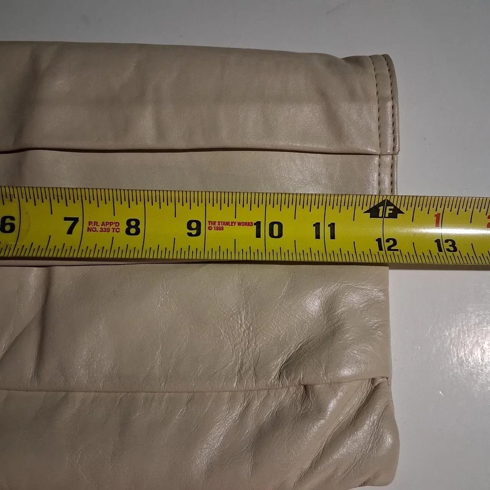 Womens 90s leather clutch bag with a boho vibe tan/cream